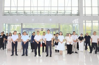 中共河南省委党史和处所史志钻研室与QMH官网乳业集团发展党建共建活动